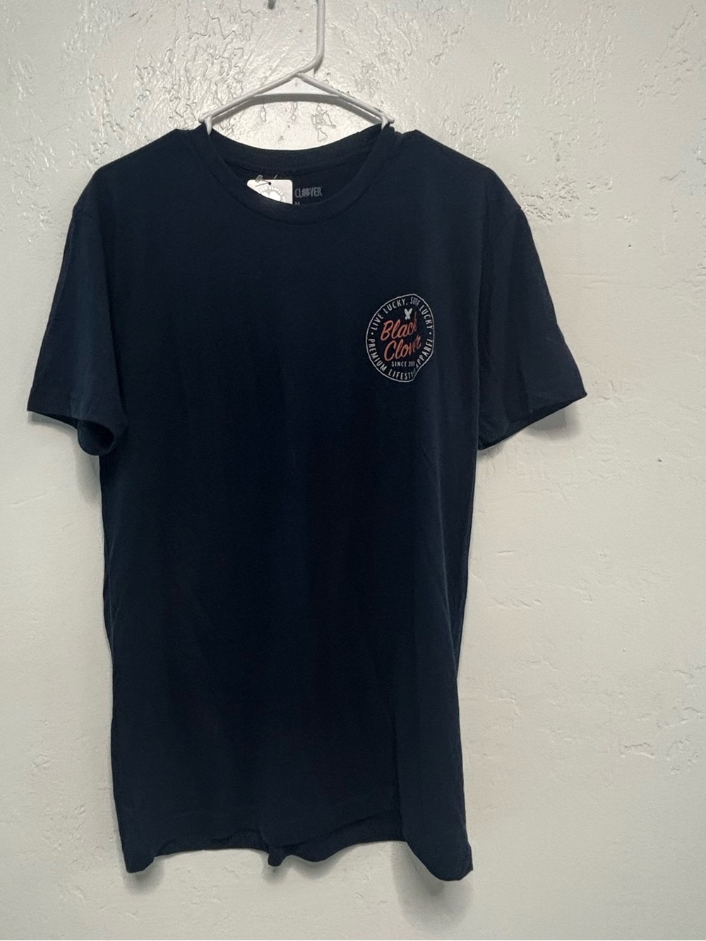 New with tags, Men’s size medium black clover brand shirt, #G1353